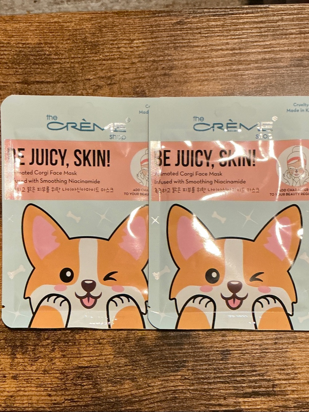 The Crème Shop Be Juicy, Skin! Corgi Face Mask — Orange & Pink